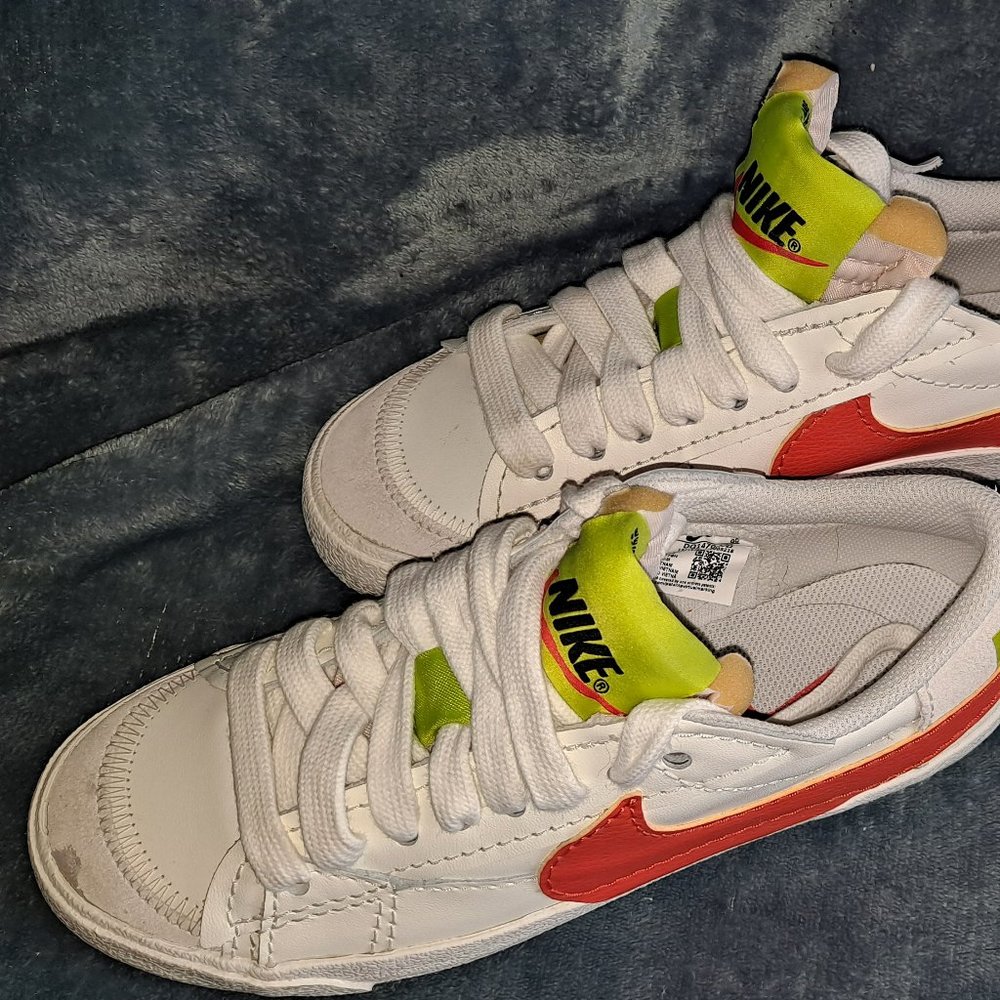 NIKE BLAZER LOW JUMBO HIGHLIGHTED IN VOLT AND ORANGE